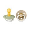 Set 2 Suzete Fosforescente Latex cu Tetina Rotunda Suzete fosforescente din latex cu tetină rotundă pentru bebeluși de peste 18 luni.