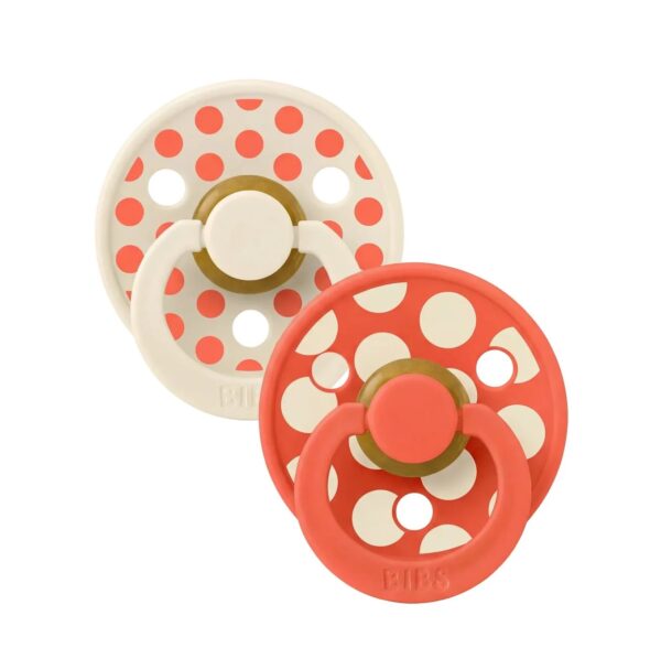 Suzete pentru bebeluși cu design polka dot Ivory și Tango.